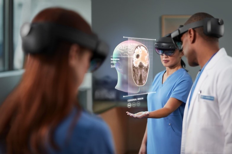 Figure 1 Doctors using VR glasses to assess the state of a human brain.